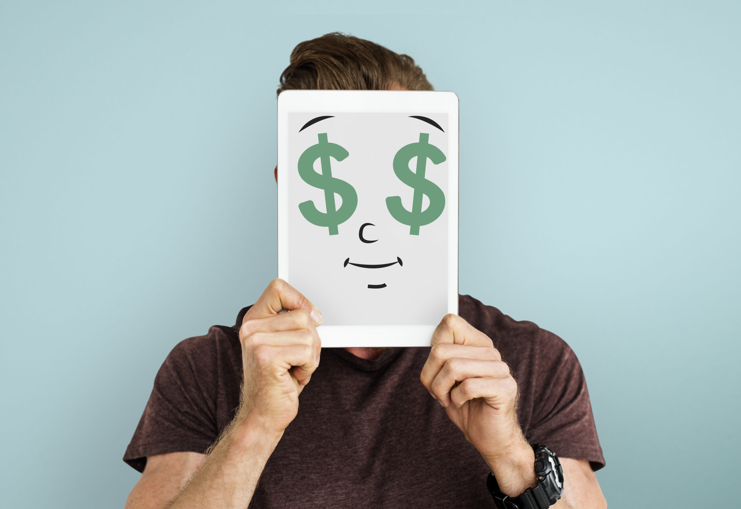 A man having a money face that is happy having an extra money of $10,000.
